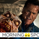 Bruce Campbell as Ash in Ash vs. Evil Dead struggles to hold onto some sort of demon.